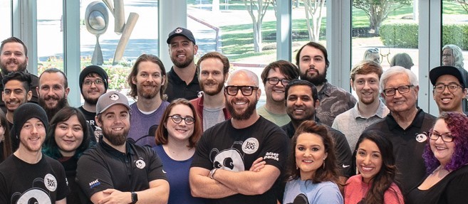 Employees at Asset Panda gather for a posed photo.